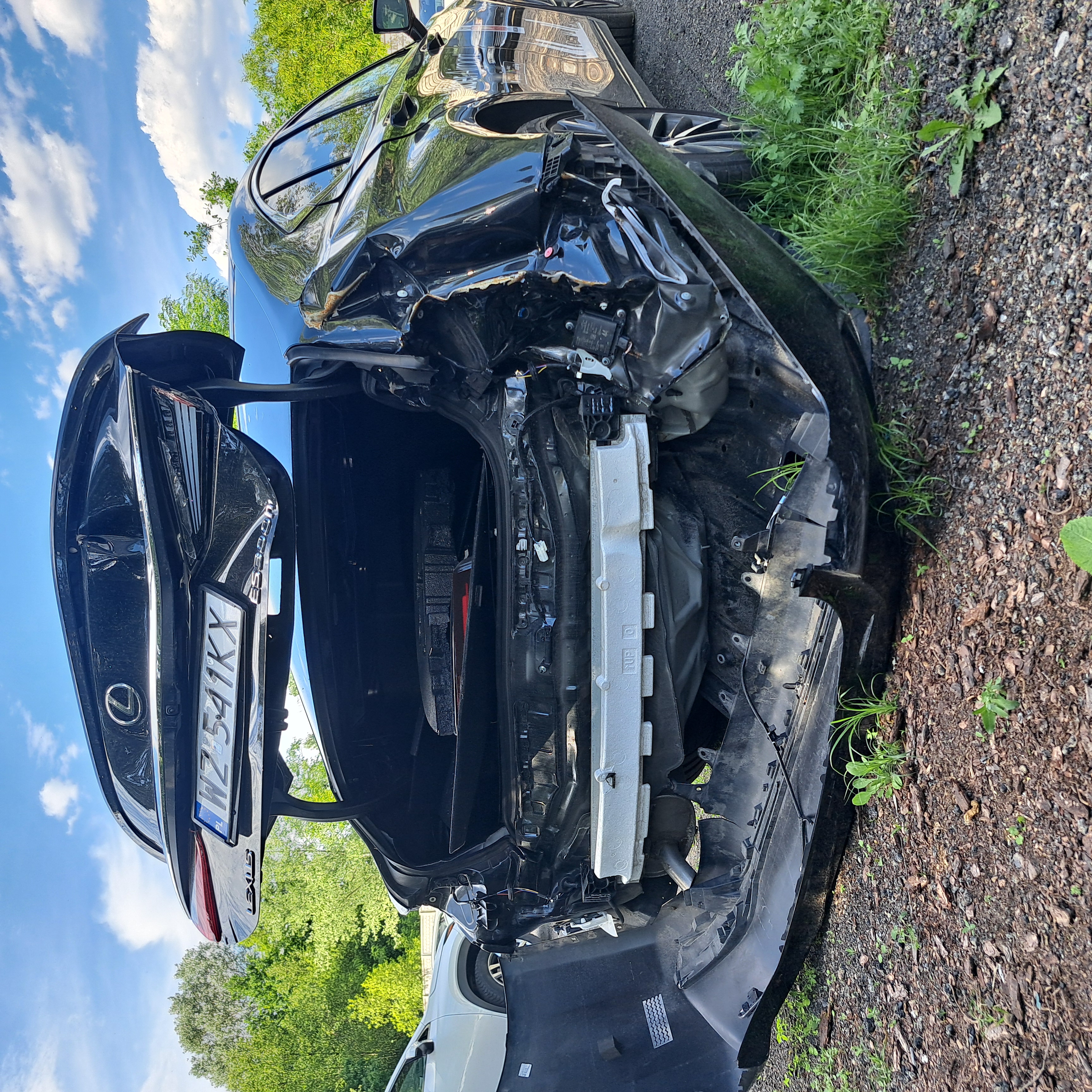 Czarny Lexus po kolizji — naprawa bezgotówkowa 77 CARS
